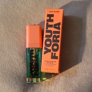 Youth Foria Color Changing Blush Oil in Chemical Reaction